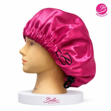 Bella's Beauty Satin Adjustable Bonnet Pink with adjustable elastic band for protecting hair while sleeping.